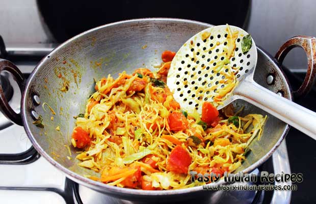 Add red chili powder, turmeric powder, sugar, coriander powder, dry mango powder and salt to taste. Stir fry on medium flame till the mixture dries Add red chili powder, turmeric powder, sugar, coriander powder, dry mango powder and salt to taste. Stir fry on medium flame till the mixture dries