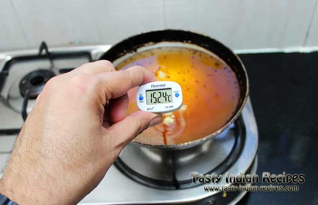 Checking Oil Temperature With Thermometer Checking Oil Temperature With Thermometer