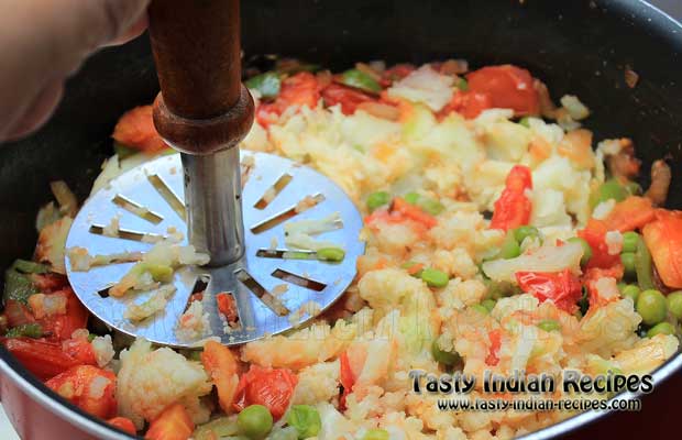 Add some water and mash it well to blend the flavors Add some water and mash it well to blend the flavors