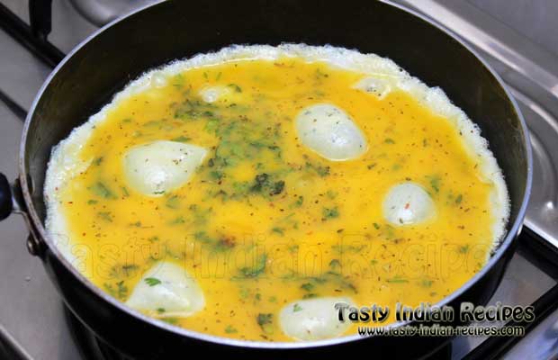 Cook the eggs over medium heat for two to three minutes till the eggs are set and the underside of the omelette is a pale gold Cook the eggs over medium heat for two to three minutes till the eggs are set and the underside of the omelette is a pale gold