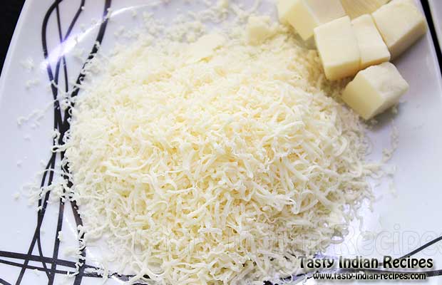Once your Pav Bhaji is ready, take it out in a serving bowl and add grated cheese on top of it Once your Pav Bhaji is ready, take it out in a serving bowl and add grated cheese on top of it