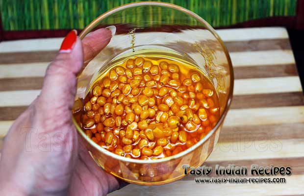 Mix the Corn seeds, butter, oil, salt and turmeric powder in a microwave proof bowl Mix the Corn seeds, butter, oil, salt and turmeric powder in a microwave proof bowl