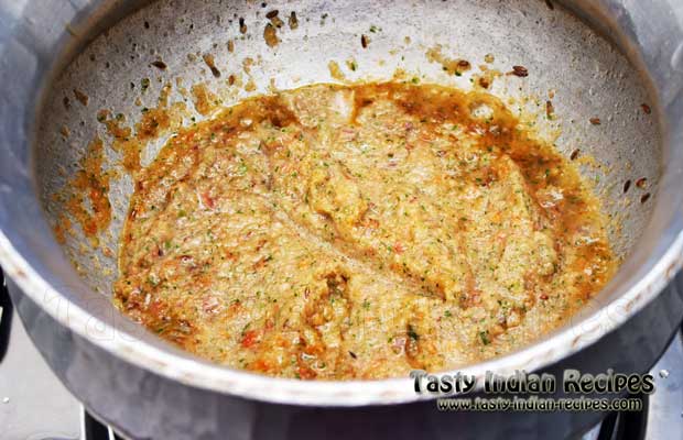Heat oil in a vessel and saute cumin and fennel seeds on low flame till they starts to pop up and then add prepared onion paste Heat oil in a vessel and saute cumin and fennel seeds on low flame till they starts to pop up and then add prepared onion paste
