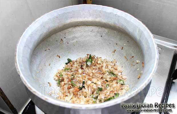 Add chopped tomatoes, salt, red chilli powder and turmeric powder and mix well.