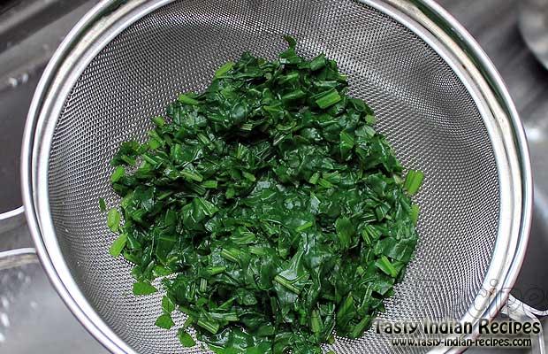 Straining Boiled Spinach Straining Boiled Spinach